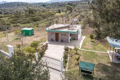 an aerial view of a house in a field at Petrino Eco Conscious Living in Kalithies