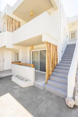 a staircase in a house with blue steps at Hacienda tradition&relax in Afantou