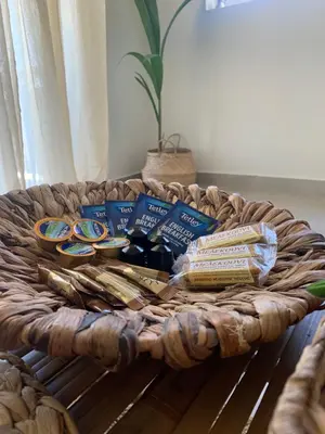 a basket filled with food on top of a table at Hacienda tradition&relax in Afantou