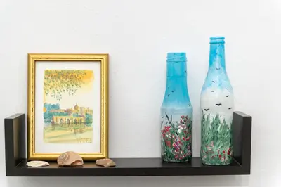 a shelf with two vases and a picture at (Stoa escape) traditional home in Archangelos