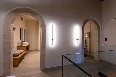 a hallway with two arches and a glass floor at Oasis Luxury House in Rhodes Town